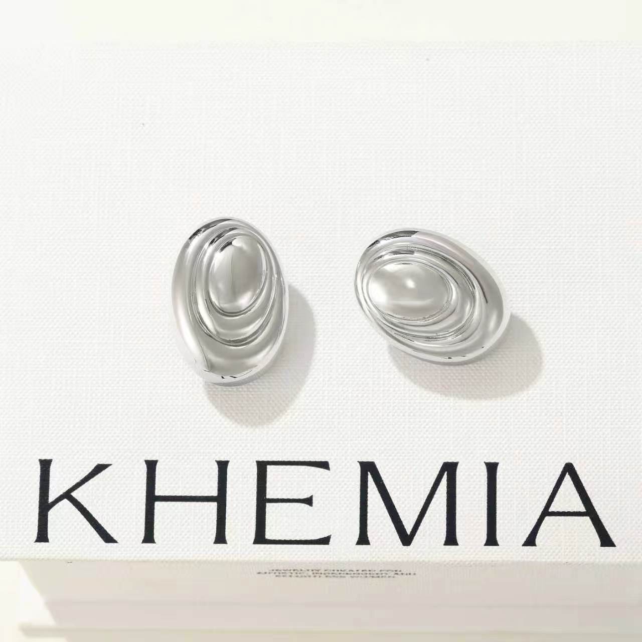 케미아 오블리크 트위스트 타원 실버 스터드 귀걸이